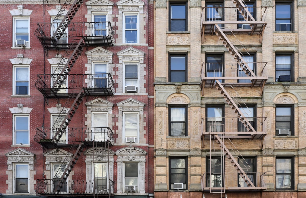 Old apartment building with fire ladder