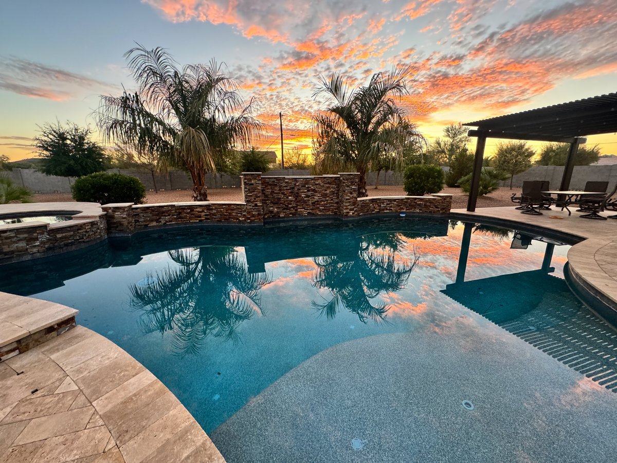 Desert sunset backyard with pool