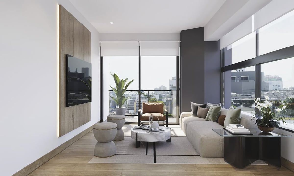 Modern apartment living room with floor-to-ceiling windows, beige sofa, round coffee table, and city views