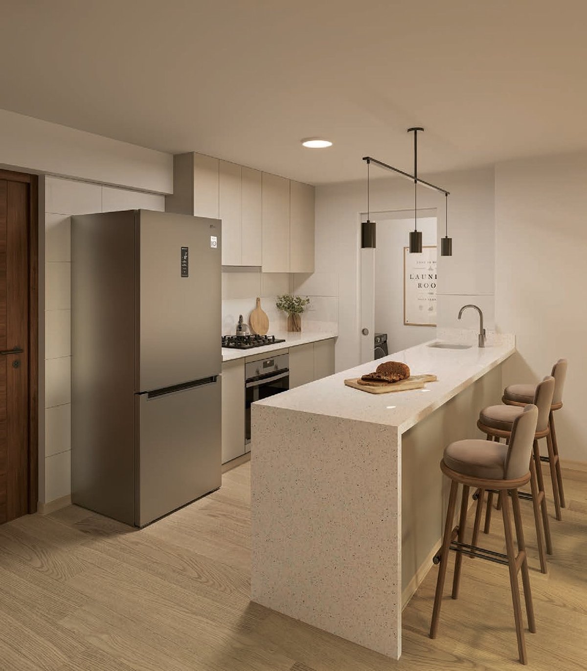 Modern kitchen with beige cabinetry, white island counter, wood bar stools, stainless steel refrigerator, and pendant lighting above the counter
