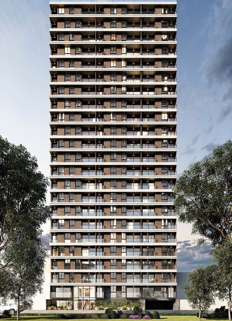 Modern multi-story residential tower with brick facade and horizontal balconies, flanked by trees against a cloudy sky