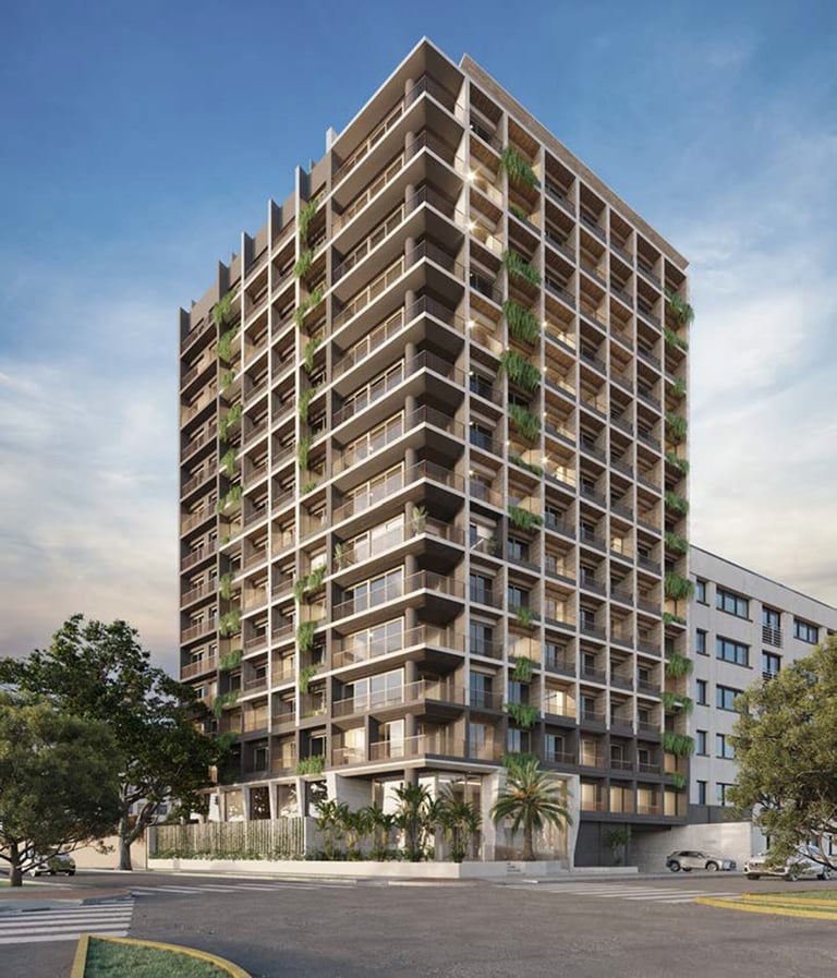 Modern multi-story residential apartment building with balconies, vegetation, and street-level ground floor parking.