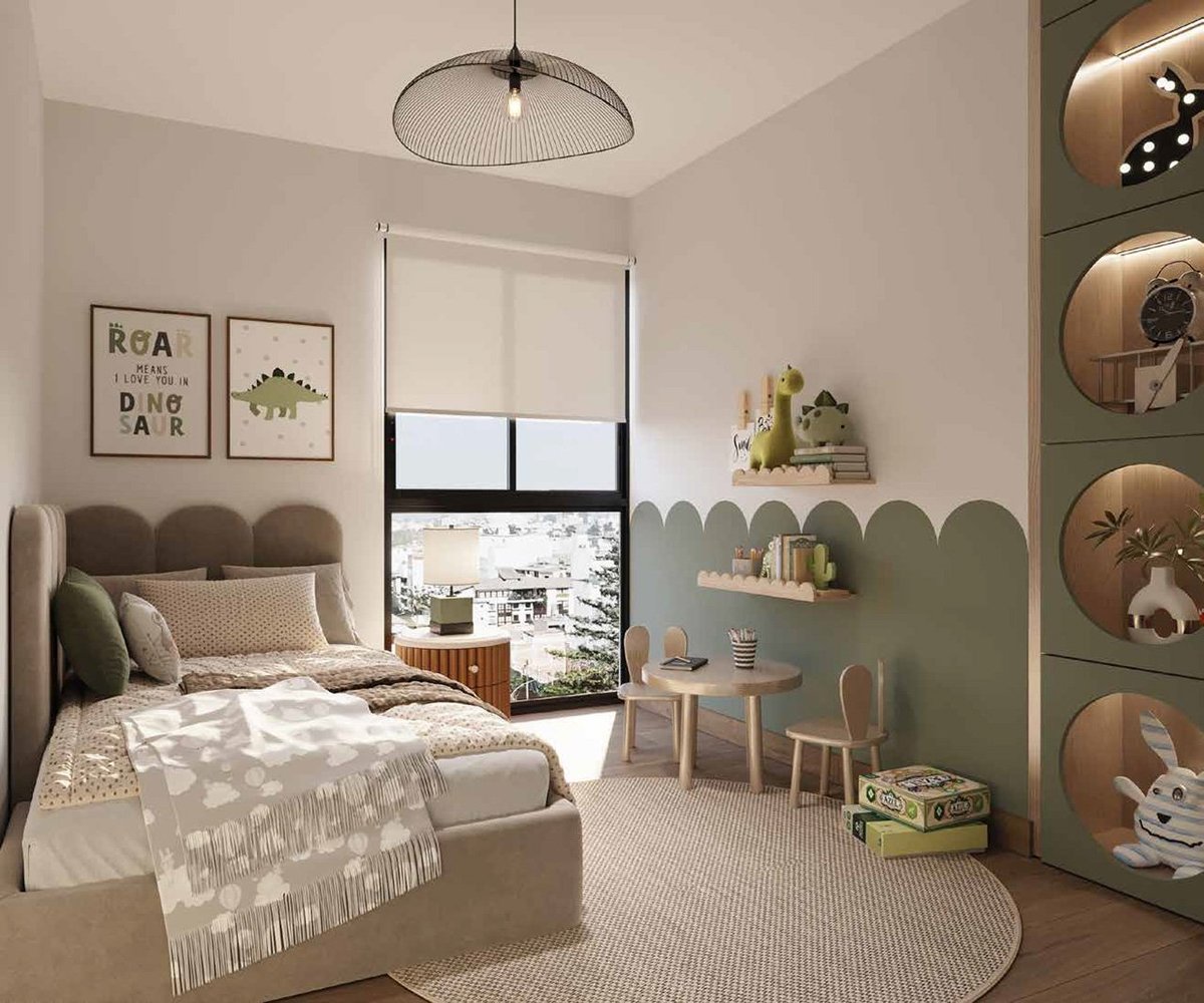 Modern childs bedroom with sage green headboard, neutral furnishings, pendant light, wall art, shelving unit with circular mirrors, and bright window