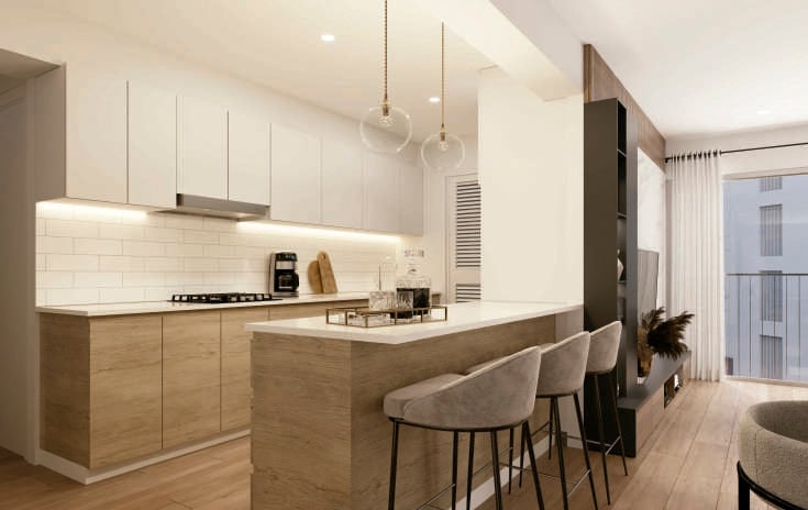 Modern kitchen with white upper cabinets, wood lower cabinets, large island with seating, pendant lights, and gas cooktop