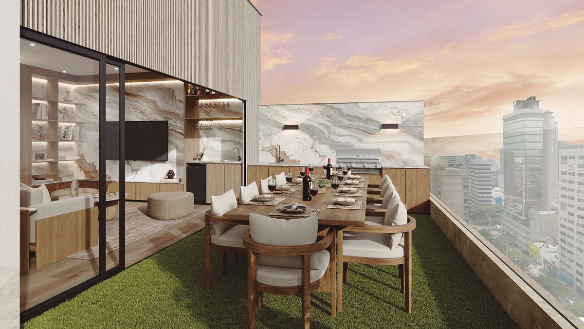 Modern rooftop terrace with wooden dining furniture, green artificial grass, and city skyline views in the background
