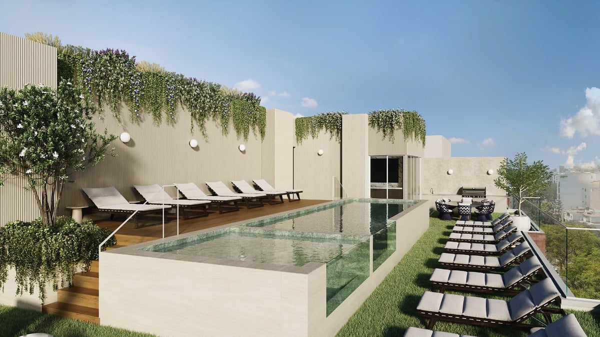 Modern rooftop pool area with lounge chairs, hanging plants, and stepped seating overlooking green city landscape