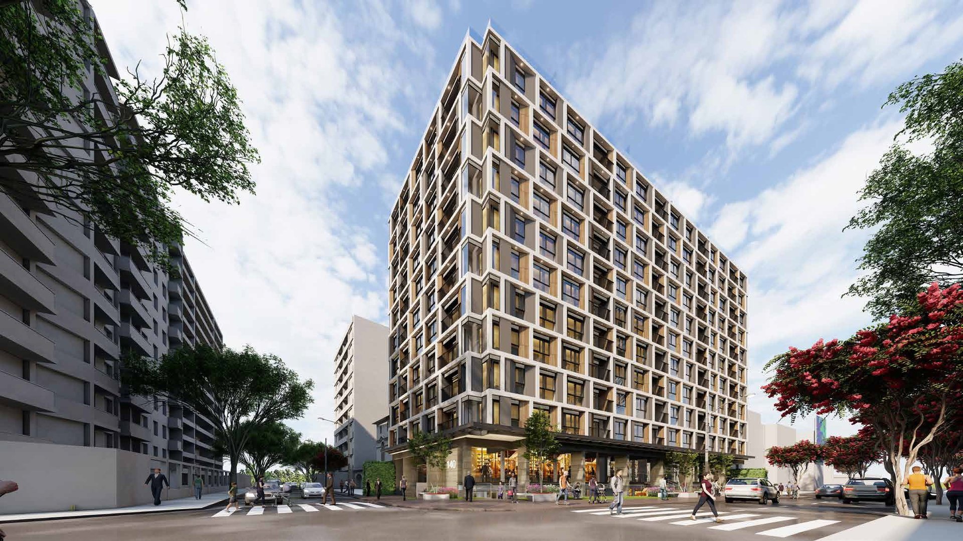 Modern residential building with horizontal balconies surrounded by trees on an urban street with pedestrians