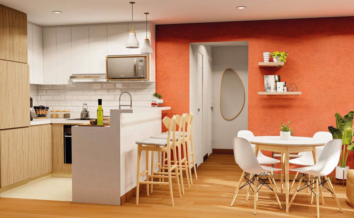 Modern open-concept kitchen and dining area with orange accent wall, wooden cabinetry, white subway tile backsplash, and contemporary furnishings.