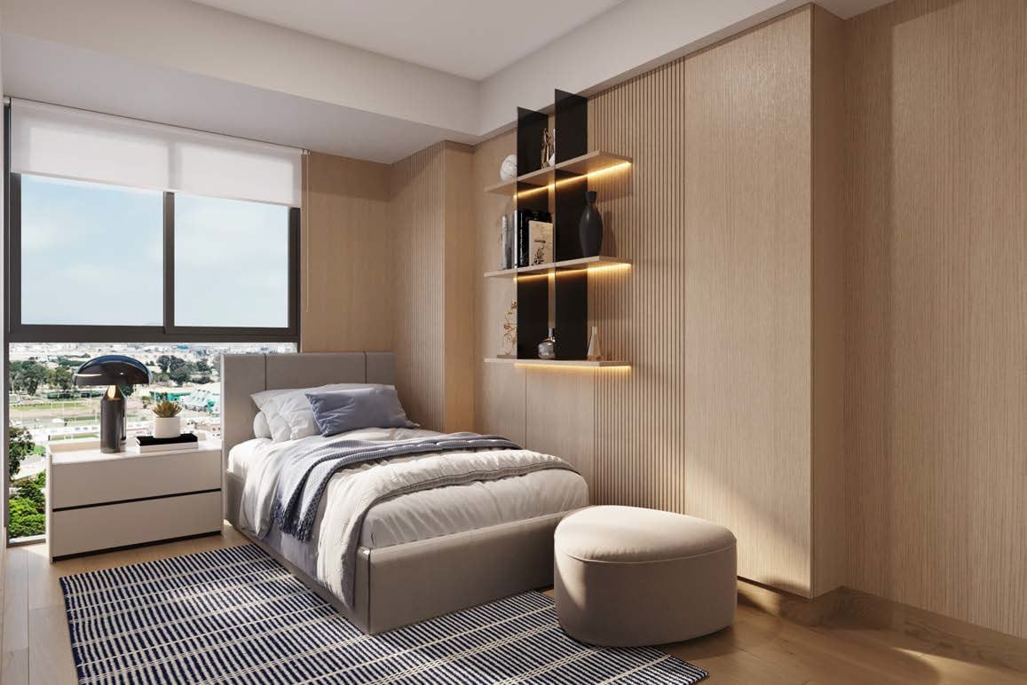 Modern bedroom with single bed, wooden wall paneling, illuminated shelving, and striped area rug with city view through large window