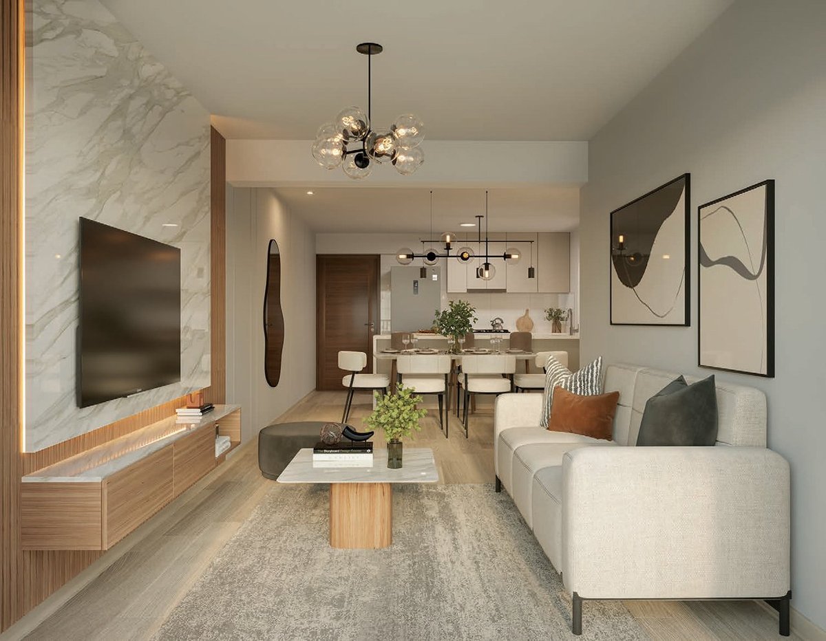 Modern open-concept apartment interior with living room, kitchen, white curved sofa, wall-mounted TV, and minimalist line art decor.
