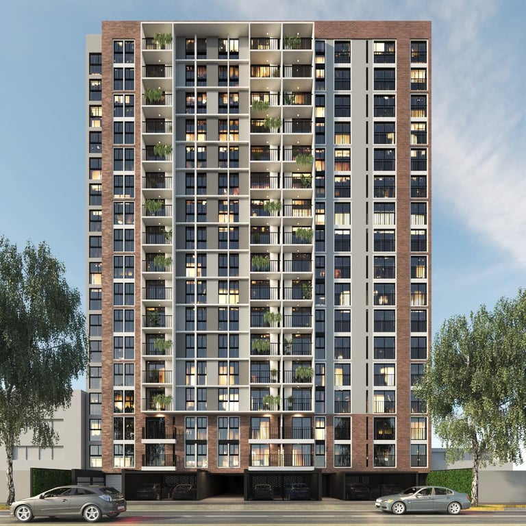 Modern multi-story residential building with brick and glass facade, featuring balconies and green plants, parked cars below