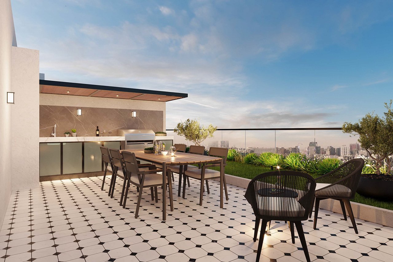 Modern rooftop terrace with outdoor dining area, kitchen station, and lounge seating overlooking cityscape
