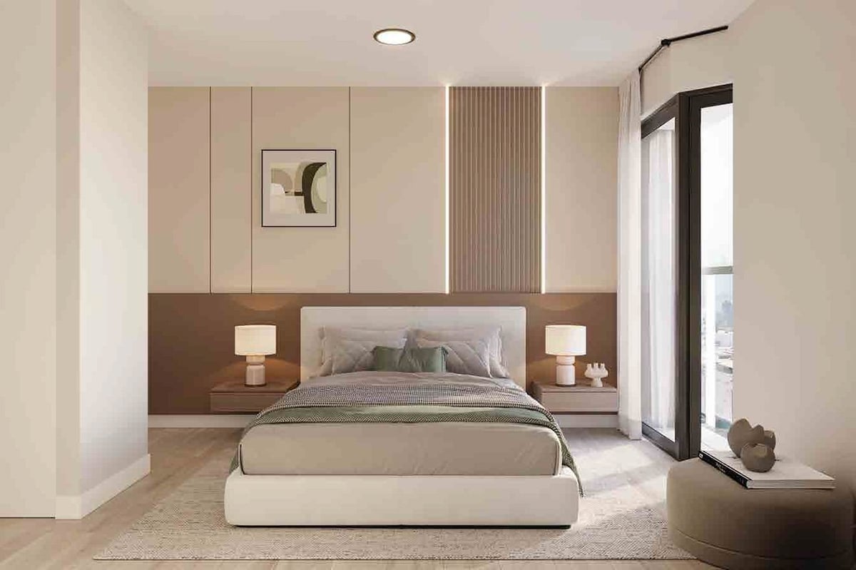 Modern minimalist bedroom with beige bed, brown accent wall, pendant lights, and floor-to-ceiling windows