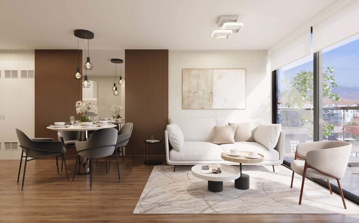 Modern open-concept living room and dining area with cream seating, wooden accents, and large windows overlooking a city view