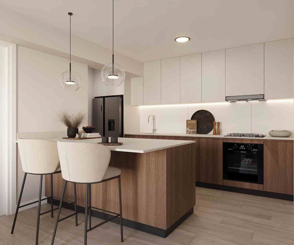 Modern kitchen with white cabinetry, wood island, and two pendant lights above white bar stools