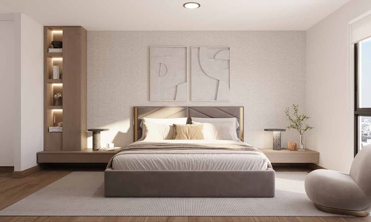 Modern minimalist bedroom with gray upholstered bed, wooden headboard accent wall, built-in shelving, and neutral decor