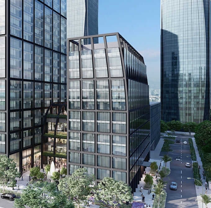 Modern glass and steel office building with geometric facade nestled among tall skyscrapers in urban cityscape