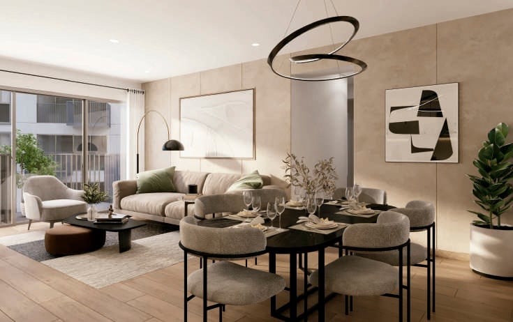 Modern living and dining area with beige walls, contemporary furniture, geometric artwork, and a circular black pendant light fixture
